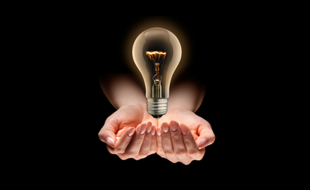 Our vision. Picture of lightbulb.